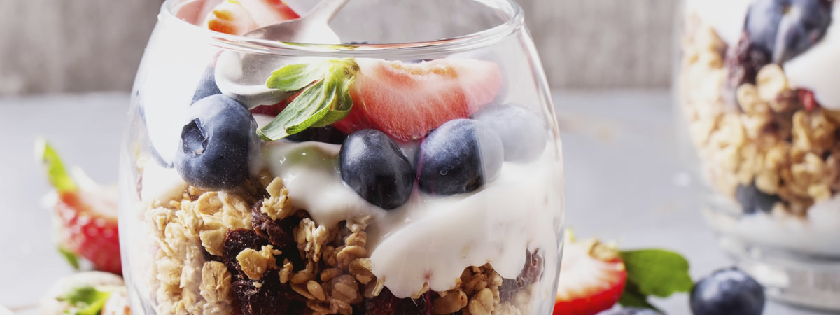 A breakfast oatmeal, yogurt and blueberry parfait